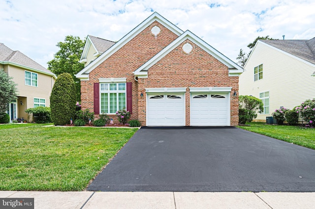 137 Keller Way, Mays Landing, NJ 08330 - traditional home with brick siding, a front yard, driveway, a garage, and central air condition unit