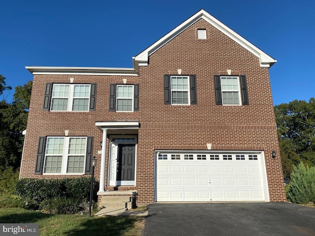 2584 Archway Ln, Bryans Road, MD 20616 - view of front of property with brick siding and asphalt driveway