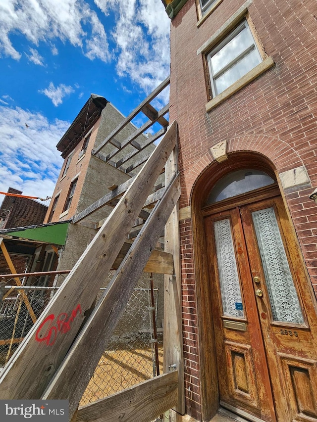 2833 Poplar St, Philadelphia, PA 19130 - doorway to property featuring brick siding