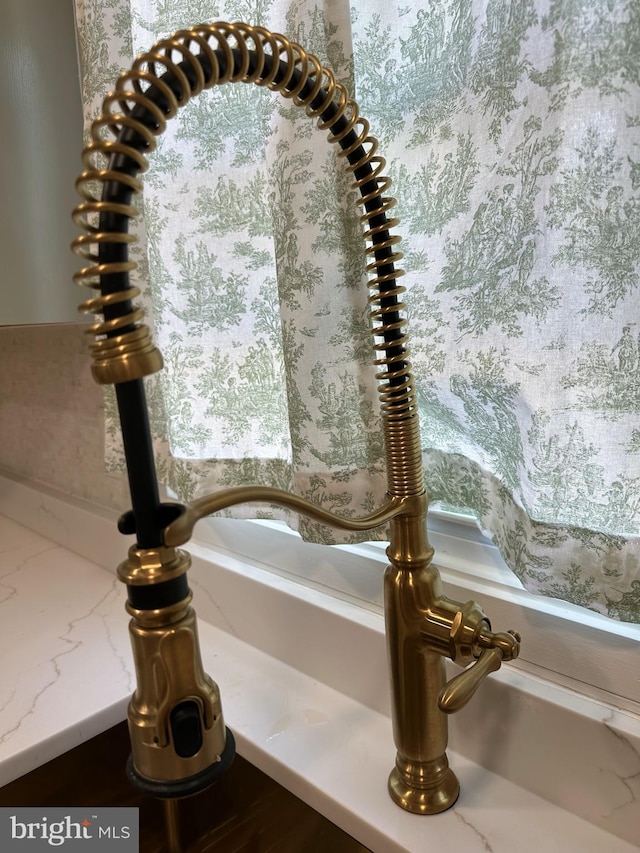 475 Ruffian Ct, Annapolis, MD 21409 - kitchen view of a sink and light stone countertops