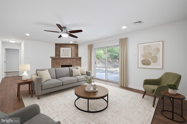 711 E Center St, Nesquehoning, PA 18240 - living area featuring wood finished floors, ceiling fan, baseboards, a fireplace, and recessed lighting