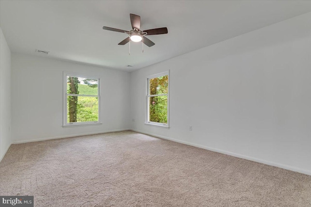 711 E Center St, Nesquehoning, PA 18240 - spare room with carpet flooring, ceiling fan, and baseboards