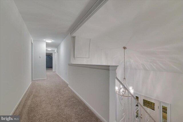 711 E Center St, Nesquehoning, PA 18240 - hall with carpet floors, an upstairs landing, and baseboards