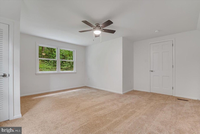 711 E Center St, Nesquehoning, PA 18240 - carpeted spare room featuring ceiling fan and baseboards