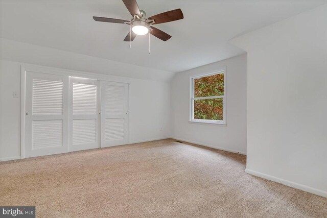 711 E Center St, Nesquehoning, PA 18240 - carpeted spare room featuring baseboards, ceiling fan, and lofted ceiling