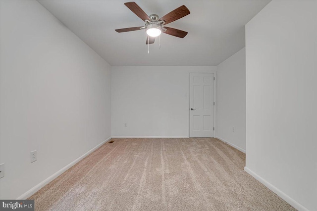 711 E Center St, Nesquehoning, PA 18240 - carpeted empty room with ceiling fan and baseboards