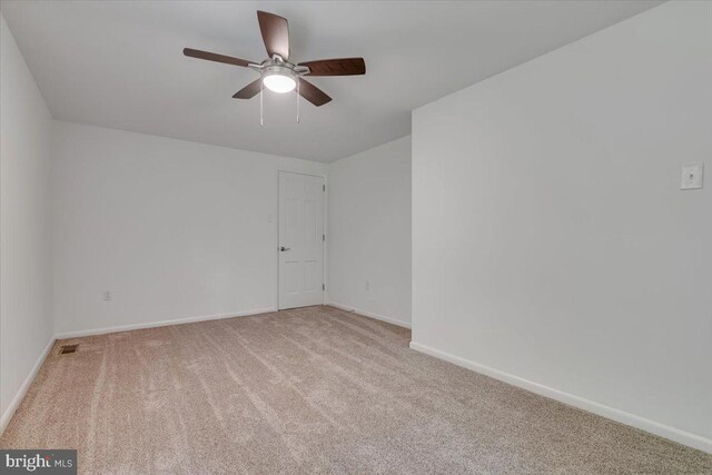 711 E Center St, Nesquehoning, PA 18240 - carpeted empty room featuring ceiling fan and baseboards