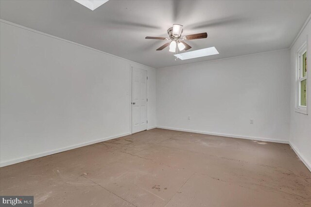 711 E Center St, Nesquehoning, PA 18240 - unfurnished room featuring a skylight, a ceiling fan, and baseboards