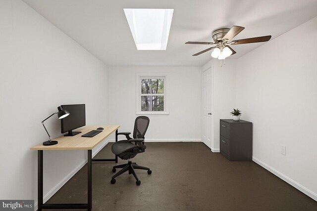711 E Center St, Nesquehoning, PA 18240 - office area featuring baseboards, ceiling fan, a skylight, and dark carpet
