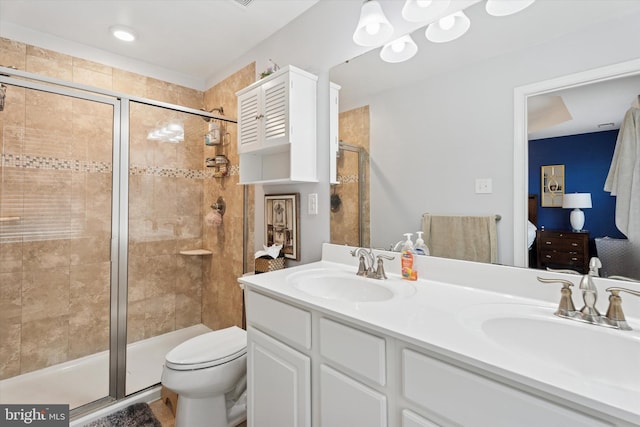 42 Mulberry Grn, Spring City, PA 19475 - bathroom featuring a shower stall, connected bathroom, double vanity, and toilet