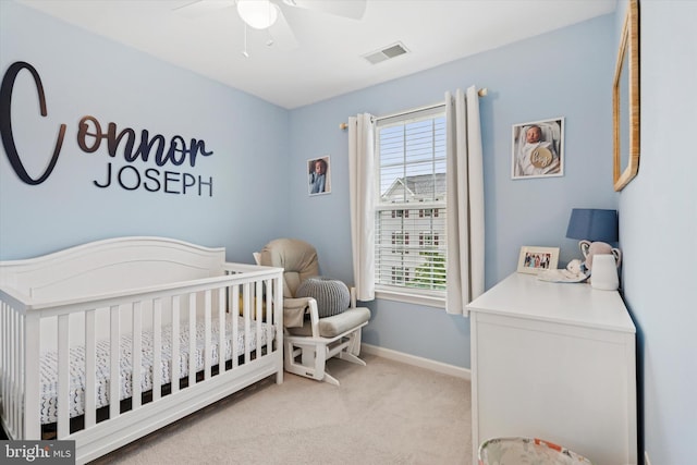 42 Mulberry Grn, Spring City, PA 19475 - bedroom featuring a crib, light colored carpet, baseboards, and a ceiling fan