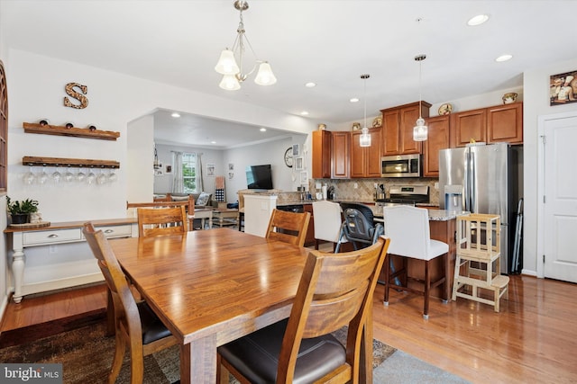 42 Mulberry Grn, Spring City, PA 19475 - dining room featuring light wood-style floors, recessed lighting, and a chandelier
