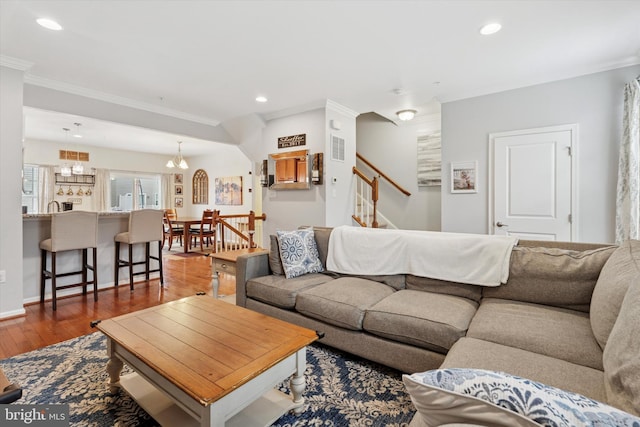42 Mulberry Grn, Spring City, PA 19475 - living room featuring wood finished floors, crown molding, recessed lighting, and stairway