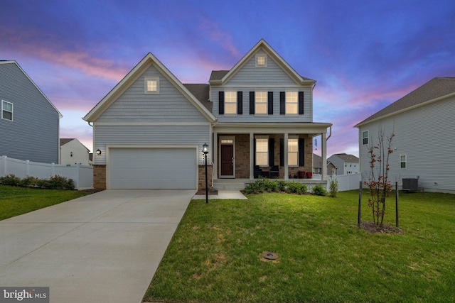 226 Triberg Dr, Charles Town, WV 25414 - craftsman-style house featuring covered porch, concrete driveway, an attached garage, and central AC