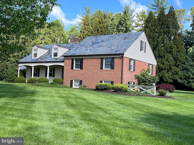 2212 Boxmere Rd, Lutherville Timonium, MD 21093 - view of front of property with a front yard, a chimney, a high end roof, and covered porch