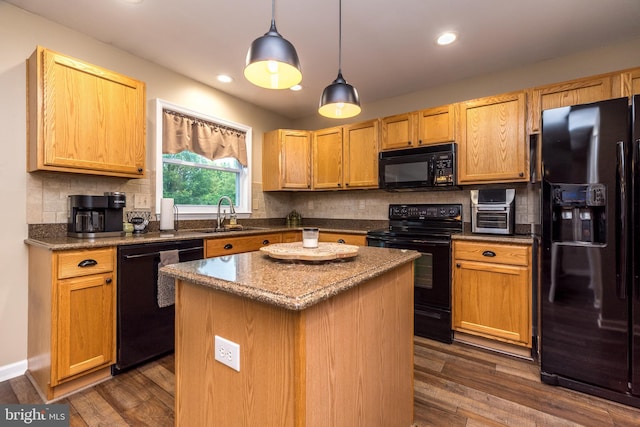 2127 Gable Ln, Quakertown, PA 18951 - kitchen featuring black appliances, a sink, dark wood finished floors, tasteful backsplash, and recessed lighting