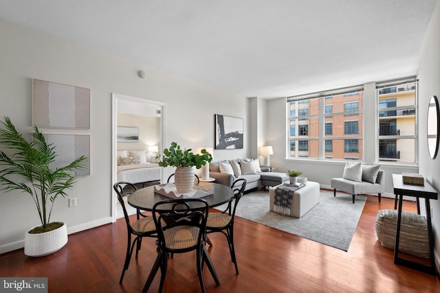 157 Fleet St Unit 1006, Oxon Hill, MD 20745 - dining space featuring wood finished floors and baseboards