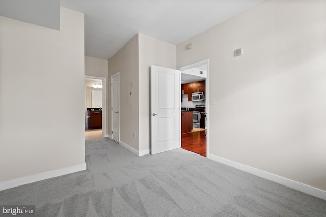 157 Fleet St Unit 1006, Oxon Hill, MD 20745 - unfurnished bedroom featuring carpet floors and baseboards