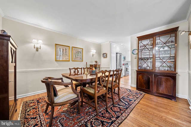 121 Hilltop Rd, Philadelphia, PA 19118 - dining space with light wood finished floors and crown molding