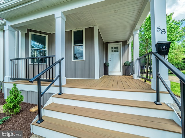 58 Park Ave, Hamilton, NJ 08690 - view of exterior entry featuring covered porch and board and batten siding