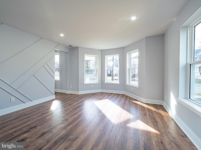 58 Park Ave, Hamilton, NJ 08690 - unfurnished living room featuring dark wood-type flooring, baseboards, and recessed lighting