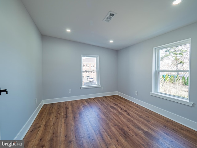 58 Park Ave, Hamilton, NJ 08690 - empty room with dark wood-style floors, baseboards, and recessed lighting
