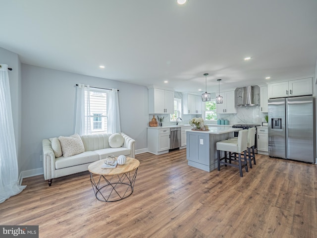 58 Park Ave, Hamilton, NJ 08690 - living room with recessed lighting, plenty of natural light, wood finished floors, and baseboards