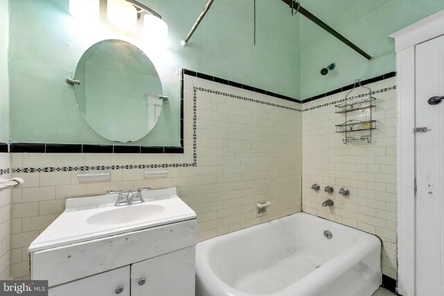 7252 Brent Rd, Upper Darby, PA 19082 - full bathroom with tile walls, vanity, and tub / shower combination
