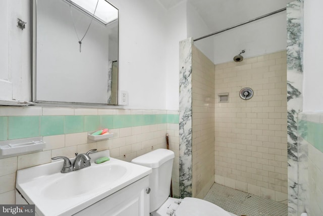7252 Brent Rd, Upper Darby, PA 19082 - full bathroom featuring a shower stall, vanity, toilet, wainscoting, and tile walls