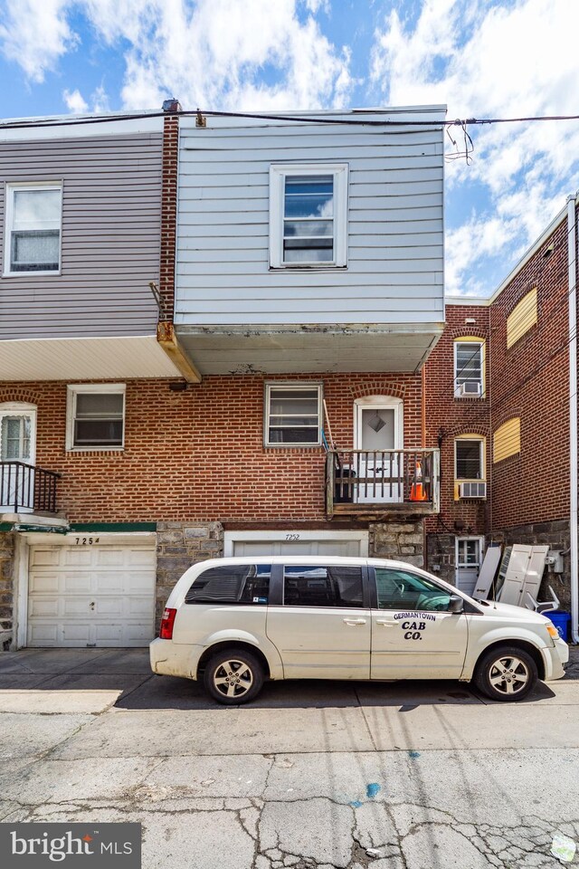 7252 Brent Rd, Upper Darby, PA 19082 - view of property with brick siding and an attached garage