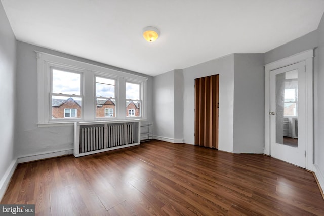 7252 Brent Rd, Upper Darby, PA 19082 - unfurnished room with healthy amount of natural light, wood finished floors, and baseboards