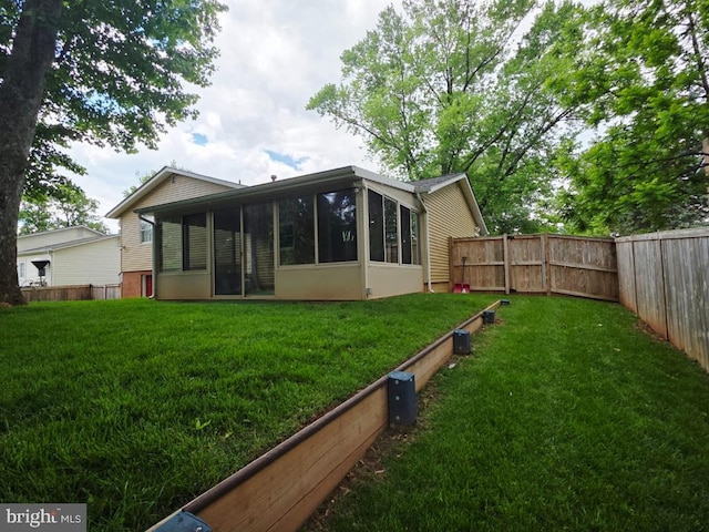 402 W Maple Ave, Sterling, VA 20164 - rear view of house featuring a sunroom