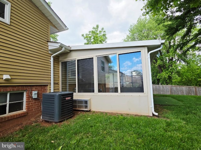 402 W Maple Ave, Sterling, VA 20164 - view of side of property with central AC and a sunroom