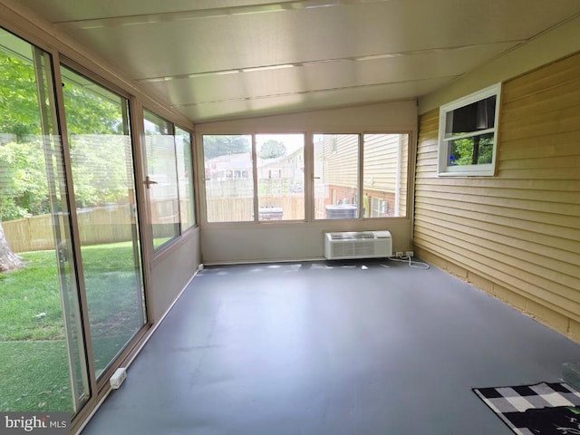 402 W Maple Ave, Sterling, VA 20164 - unfurnished sunroom featuring a wall mounted air conditioner and lofted ceiling