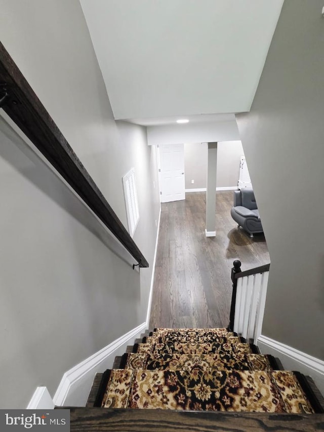 402 W Maple Ave, Sterling, VA 20164 - stairs with wood finished floors and baseboards