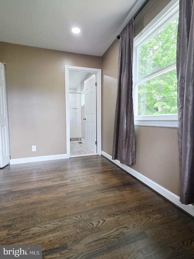 402 W Maple Ave, Sterling, VA 20164 - spare room featuring baseboards, wood finished floors, and recessed lighting