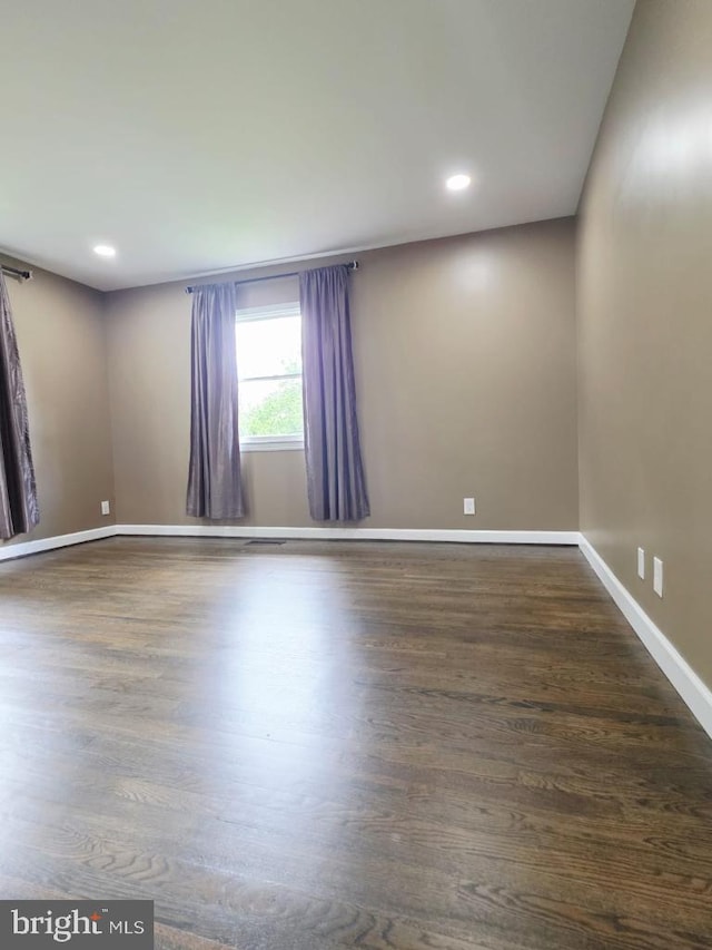 402 W Maple Ave, Sterling, VA 20164 - empty room with recessed lighting, dark wood-style floors, and baseboards