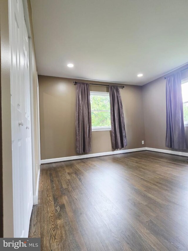 402 W Maple Ave, Sterling, VA 20164 - unfurnished room with wood finished floors, recessed lighting, and baseboards
