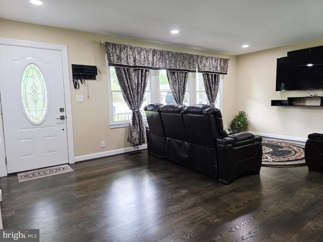 402 W Maple Ave, Sterling, VA 20164 - living area featuring dark wood-type flooring, baseboards, and recessed lighting
