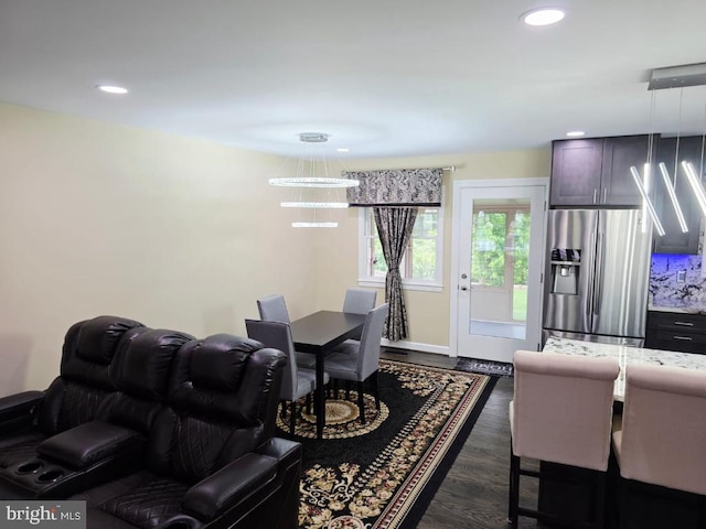 402 W Maple Ave, Sterling, VA 20164 - living room with recessed lighting and dark wood-style floors