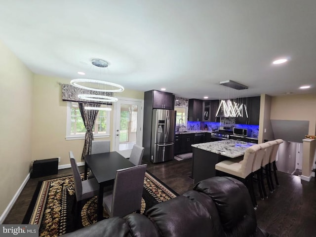 402 W Maple Ave, Sterling, VA 20164 - living room with baseboards, dark wood finished floors, and recessed lighting