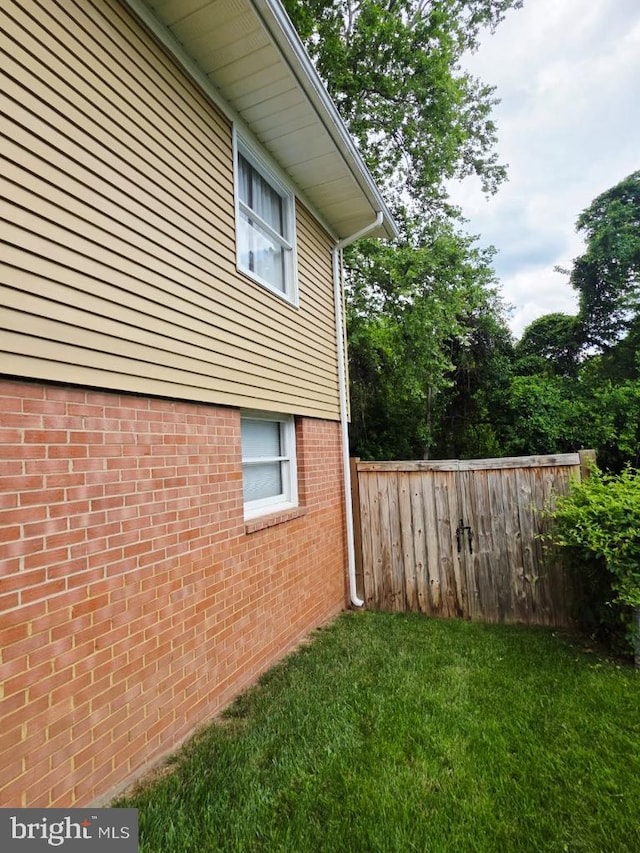 402 W Maple Ave, Sterling, VA 20164 - view of property exterior featuring brick siding