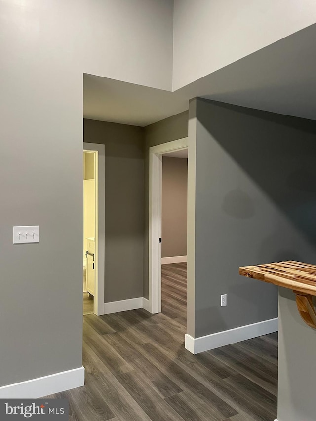 211 Workman Dr, Keyser, WV 26726 - hall with baseboards and dark wood-type flooring