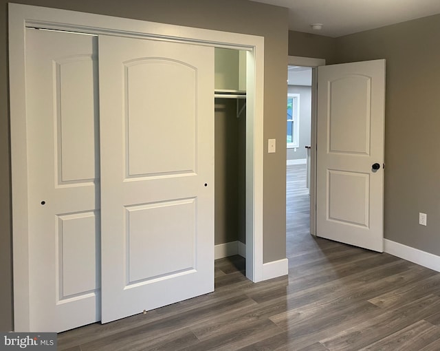 211 Workman Dr, Keyser, WV 26726 - unfurnished bedroom with a closet, baseboards, and dark wood finished floors