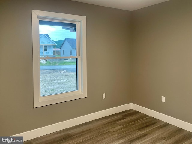 211 Workman Dr, Keyser, WV 26726 - empty room with baseboards and dark wood-style floors