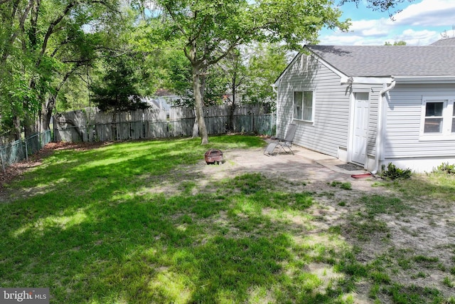 207 Coville Dr, Browns Mills, NJ 08015 - view of yard with a fire pit