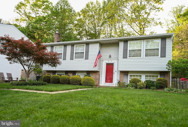 8110 Winter Blue Ct, Springfield, VA 22153 - raised ranch with brick siding, a chimney, and a front lawn