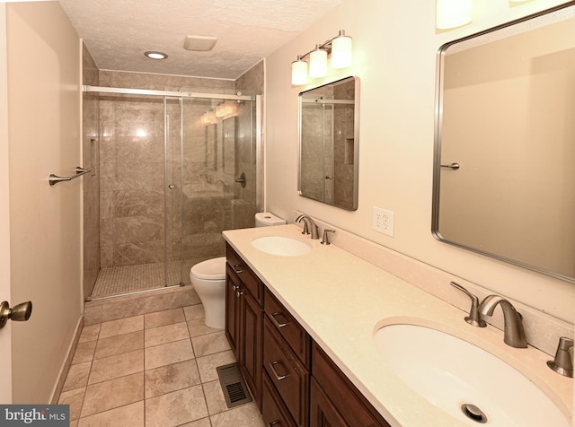 8110 Winter Blue Ct, Springfield, VA 22153 - full bathroom with toilet, a stall shower, double vanity, a textured ceiling, and tile patterned flooring