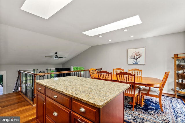 3195 Atlee Ridge Rd, New Windsor, MD 21776 - kitchen with a skylight, light wood-style floors, a center island, recessed lighting, and lofted ceiling