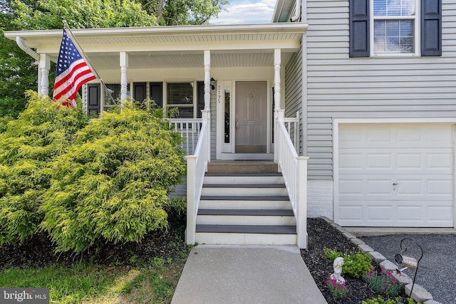 3195 Atlee Ridge Rd, New Windsor, MD 21776 - property entrance with a garage and covered porch